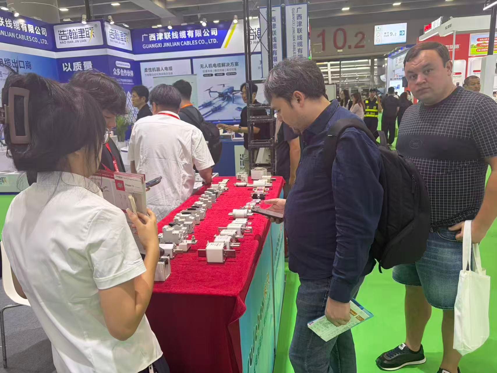 Visitors viewing Minggao fuse products at the Guangzhou solar and energy storage expo